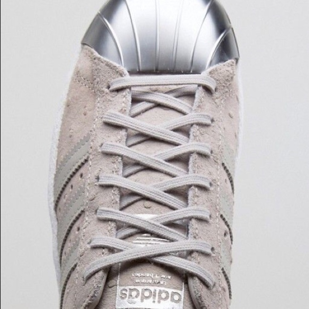 Adidas sneakers with silver plaited toe
